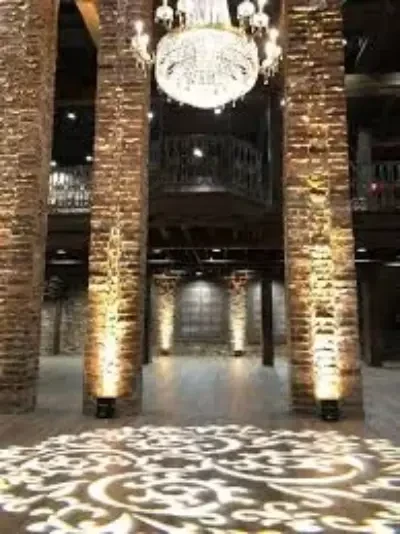 Custom tall brown brick arches inside the Bedford 