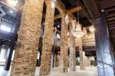 Custom tall brown brick arches inside the Bedford 
