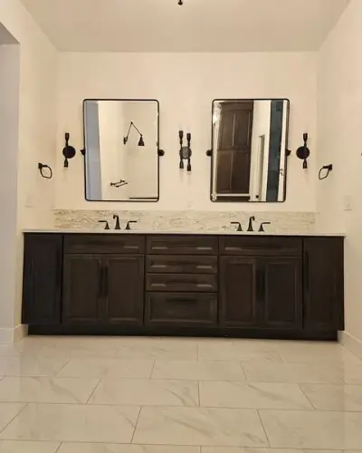 Dark Brown and Marble Master Bathroom with square mirrors