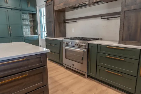 Custom kitchen with olive green and brown wood