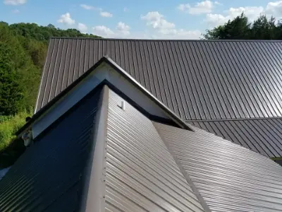 large black metal roof with multiple levels