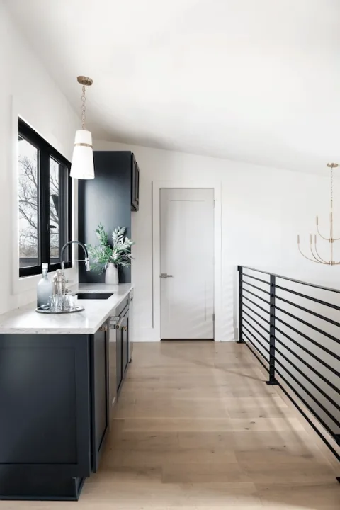 wide hallway with a custom bar